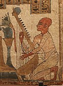 Egyptian harper playing ladle harp