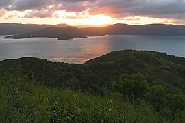 Sunset over mainland from summit of South Molle Island's Mount Jeffreys