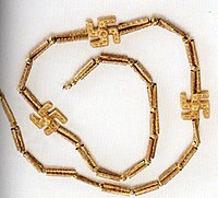 A swastika necklace excavated from Marlik, Gilan province, northern Iran, circa 1,200 - 1,050 BCE