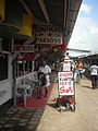 Image 22Butcher in the Central Market in Paramaribo with signs written in Dutch (from Suriname)