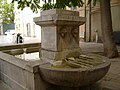The Fontaine-Lavoir de Saint-Vincent, Place Saint-Vincent (1832), replaced the original fountain built in 1615. It had a fountain for drinking water and two basins, for washing clothes, one for washing and one for rinsing.