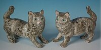 Pair of Staffordshire cat figures, circa 1920.