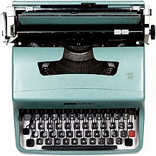 Photograph of a turquoise-blue mechanical typewriter