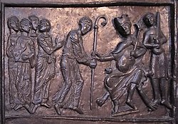 San Adalbertu ye fechu obispu, escena de les puertes de bronce de la catedral de Gniezno (Polonia).