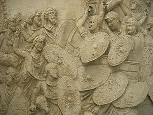 Roomalaiset ja daakialaiset joukot taistelussa Trajanuksen pylväässä.