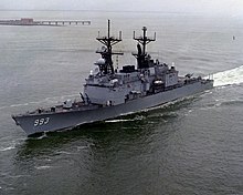 Aerial view of USS Kidd entering a harbour