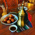 Image 22Luqaimat (lugaimat in Emirati dialect), a traditional Emirati dessert, served with Arabic coffee. (from Emirati cuisine)