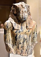 Upper part of a statue of Senusret I, from Egypt, Middle Kingdom, 12th Dynasty. C. 1950 BCE. Neues Museum, Germany