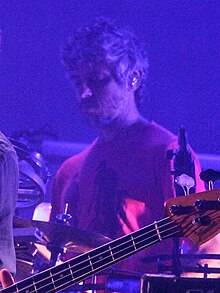 Refosco performing with Atoms for Peace in 2013