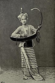 An early 20th century photo depicting a Burmese maiden with the saung