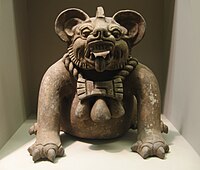 A funerary urn in the shape of a "bat god" or a jaguar, from Oaxaca, Mexico, dated to 300–650 CE. Height: 9.5 in (23 cm).