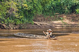 Woman fishing in Laos