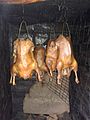 The smoking of geese in a home smokehouse