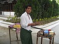 To hpu thouk (Burmese tofu salad) hawker at Kuthodaw Pagoda, Mandalay