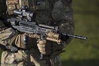 Soldier holding an assault rifle