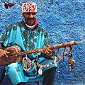 Image 23A gnawa street performer wearing traditional gnawi clothing in Rabat's Qasbat al-Widaya (from Culture of Morocco)