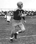 A photo of Don Hutson running with the football