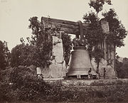 The Mingun Bell resting on the ground after losing its supports to the quake, pictured in 1873