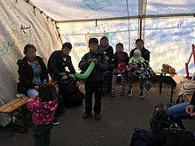 Flüchtlingsgruppe in Salzburg kurz vor dem geregelten Übergang nach Deutschland
