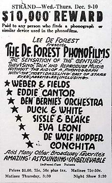All-text advertisement from the Strand Theater, giving dates, times, and performers' names. At the top, a tagline reads, "$10,000 reward paid to any person who finds a phonograph or similar device used in the phonofilms." The accompanying promotional text describes the slate of sound pictures as "the sensation of the century ... Amazing! Astounding! Unbelievable".