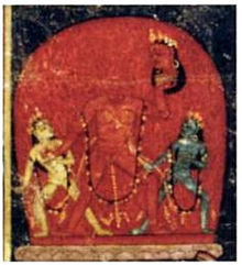 A decapitated, nude, red-complexioned woman stands, raising her left arm, which holds her severed head. She is flanked by two smaller, nude women: a white-coloured one (left) and a blue-coloured one (right).