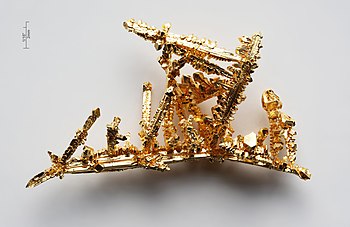 Synthetic gold crystal