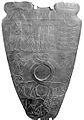 Narmer Palette: bull overpowering warrior motif, (similar)