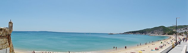The Gold Beach coastline (Praia do Ouro) at Sesimbra, traditional Portuguese fishing village bay, part of the Blue Coast region