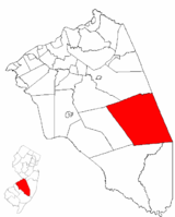 Woodland Township highlighted in Burlington County. Inset map: Burlington County highlighted in the State of New Jersey.