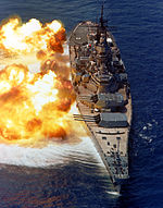 USS Iowa (BB-61) fires her 16-inch/50-caliber guns during a fire power demonstration sometime after her 1980s modernization.