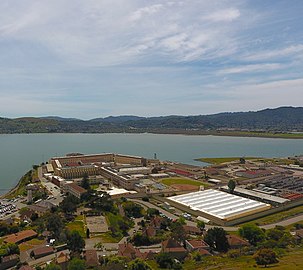 Aerial view of San Quentin, including the housing units, yard, education center, and Prison Industry Authority facilities