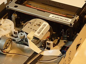 VXA-1 tape drive with tape loaded, view from rear left