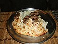 Image 26Bosnian ćevapi with onions in a somun. (from Culture of Bosnia and Herzegovina)