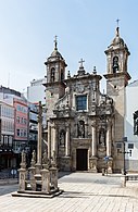 A cruceiro, or wayside cross, and San Xurxo church in A Coruña