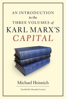 Cover art for the 2012 English edition of the book. At the top it reads "An Introduction to the Three Volumes of Karl Marx's Capital". Below there is a picture of three hardcover volumes of Capital. At the bottom it reads "Michael Heinrich" with small text below that reads "Translated by Alexander Locascio".