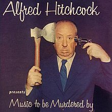 A photo of Hitchcock holding an axe and a revolver to his temples