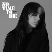Cover art for "No Time to Die": a grey-scale photo of Billie Eilish with her eyes closed